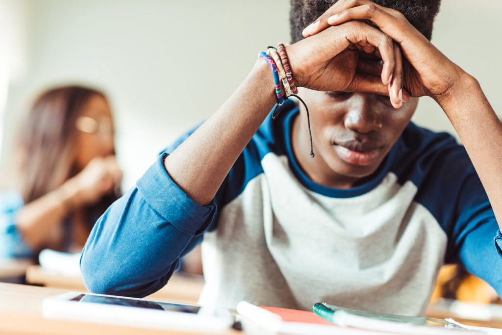 A depressed college student. Image credit: iStock
