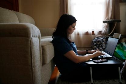 A woman with symptoms of long Covid working from home in Massachusetts in August 2020.