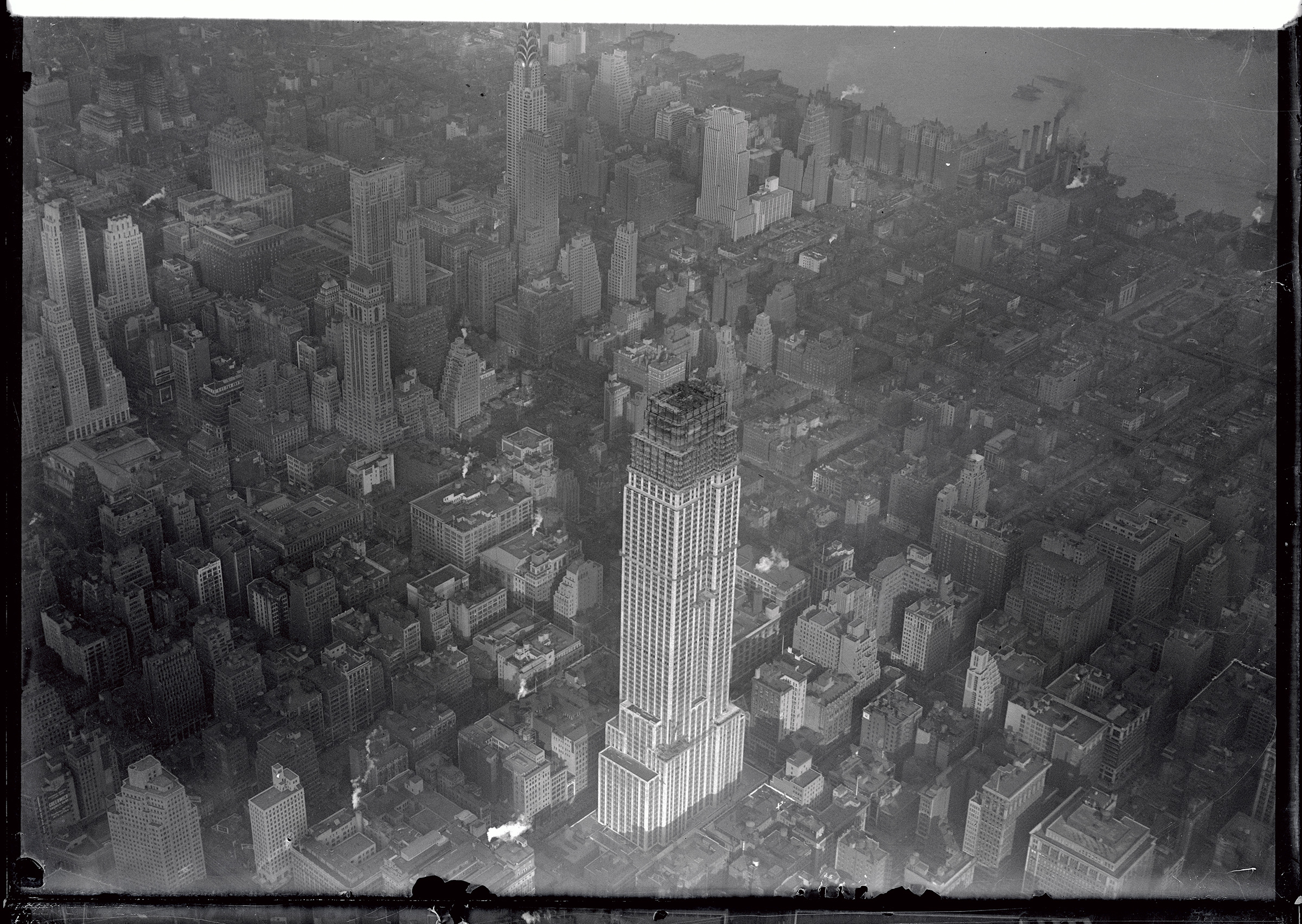 An aerial photograph of The Empire State Building from October 1930. At the time, there were 88 stories finished.