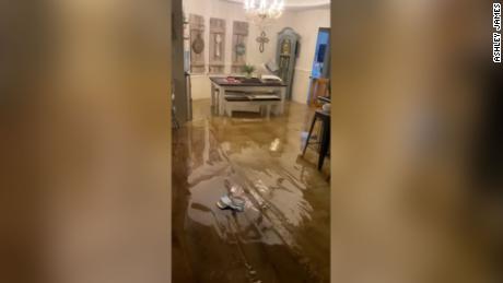 Floodwater entered Ashley James&#39; home in Slidell, Louisiana, early Saturday.